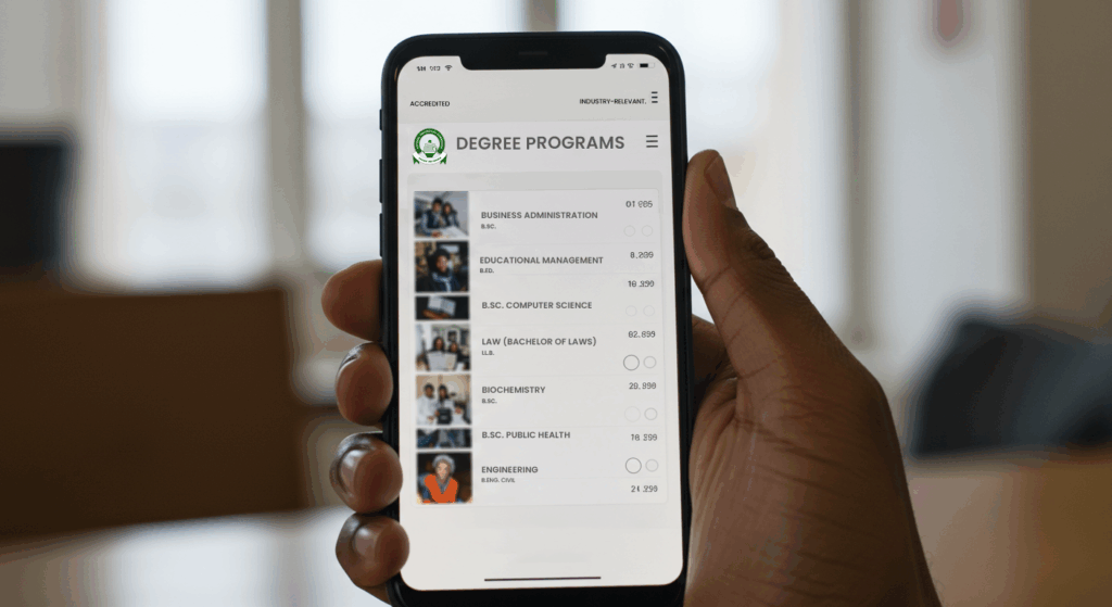 A hand holding a smartphone displaying a list of degree programs to help choose the right course for career goals.